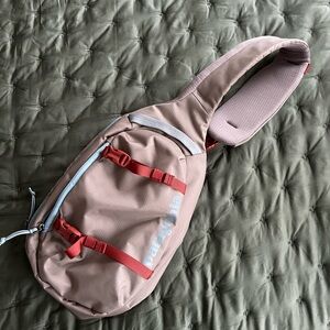 Patagonia Blush and Red Sling Pack